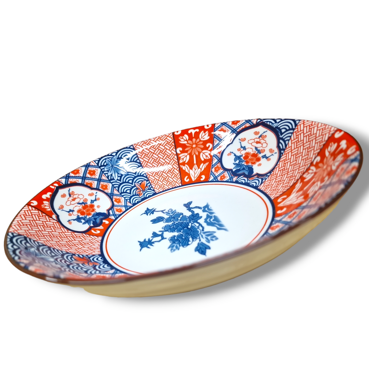 Liten djup fat japansk blå röd imari porslin